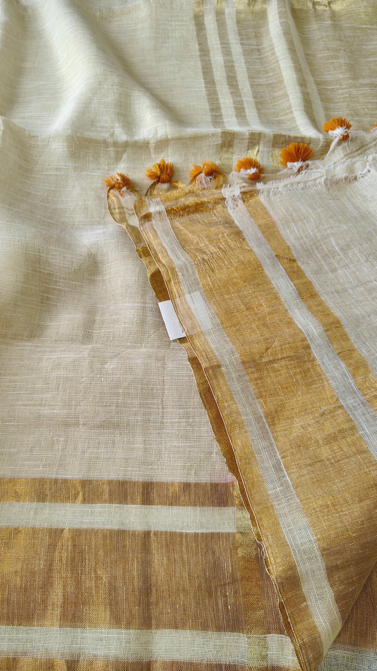 Off white & golden pure lenin saree