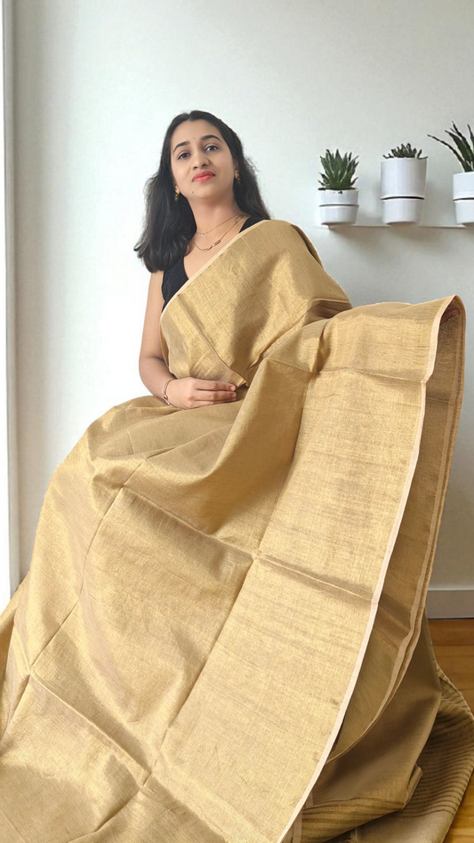 Golden metallic linen saree